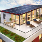 Solar panels on the roof of the modern house and terrace